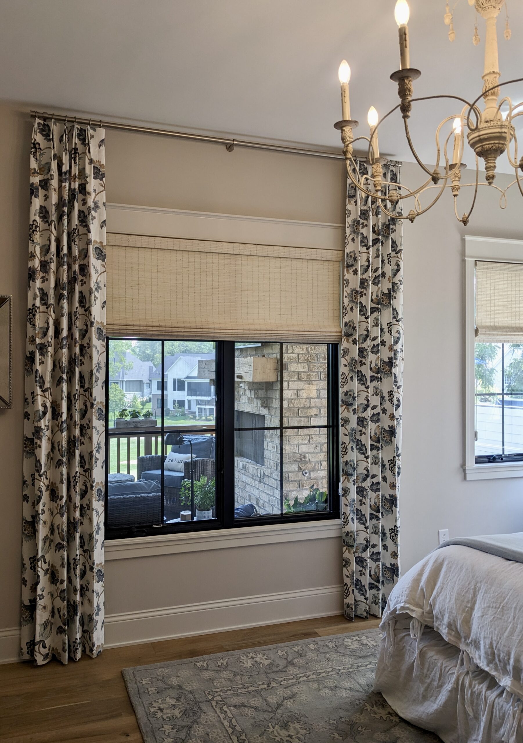 floral drapes with woven wood shades