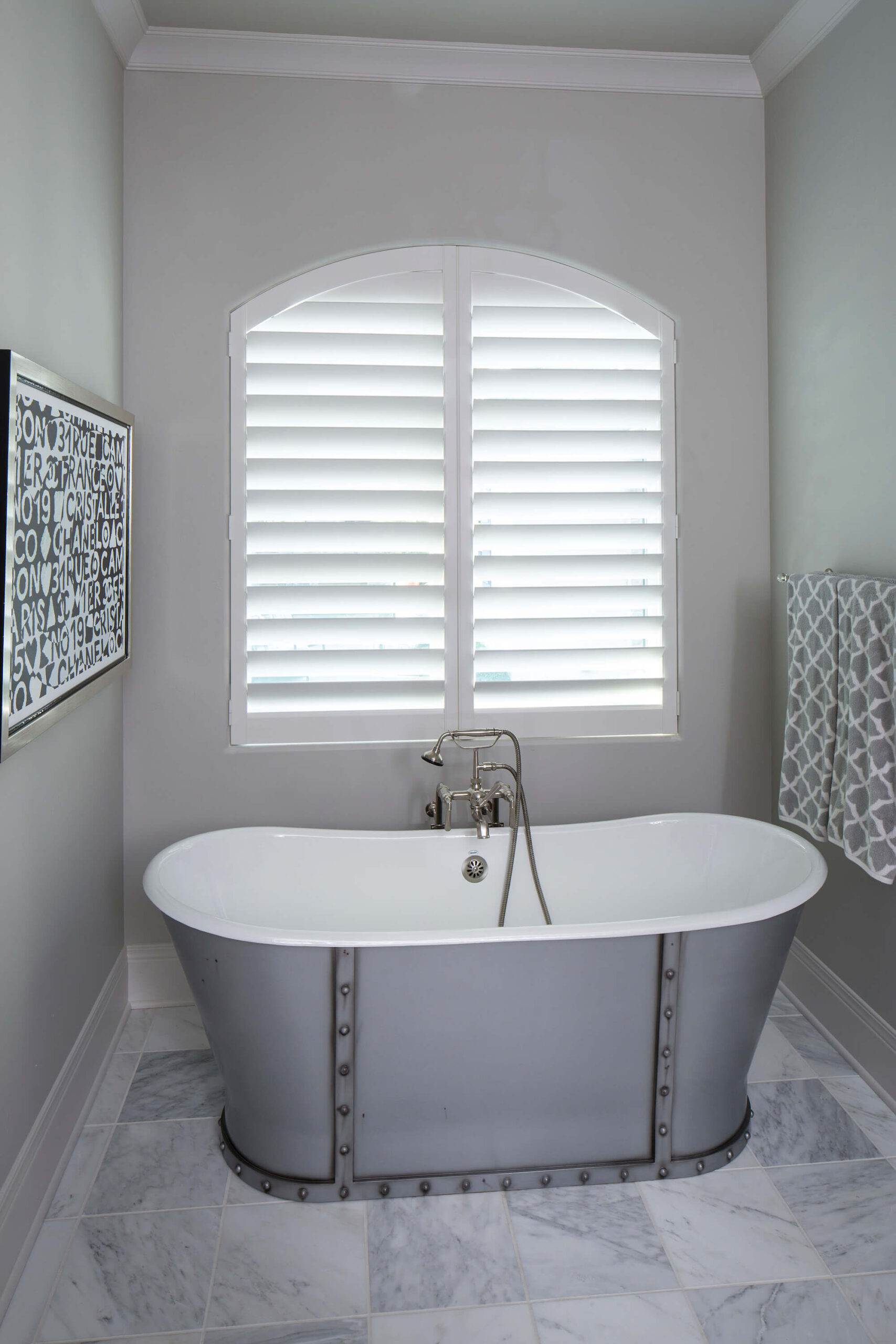 White Hunter Douglas Heritance shutters in master bath