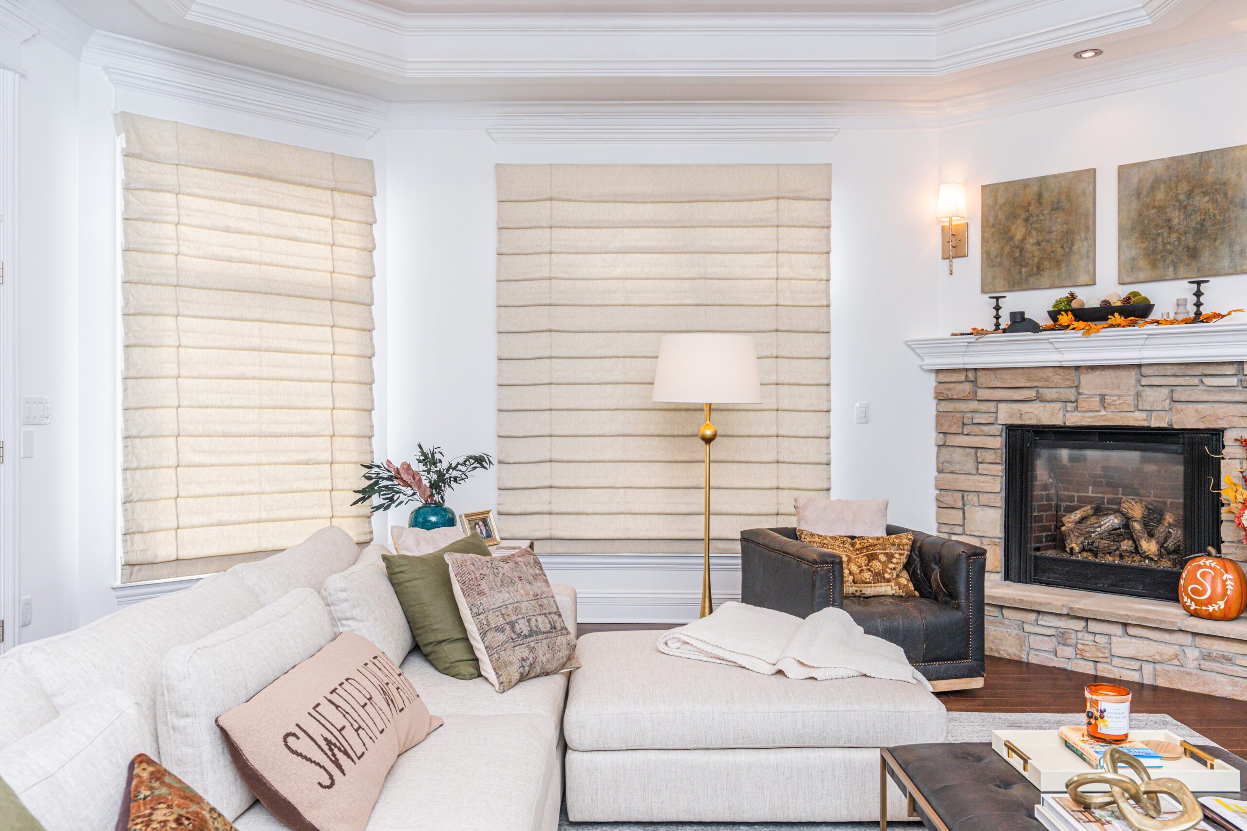 Hobbled Roman shades in living room