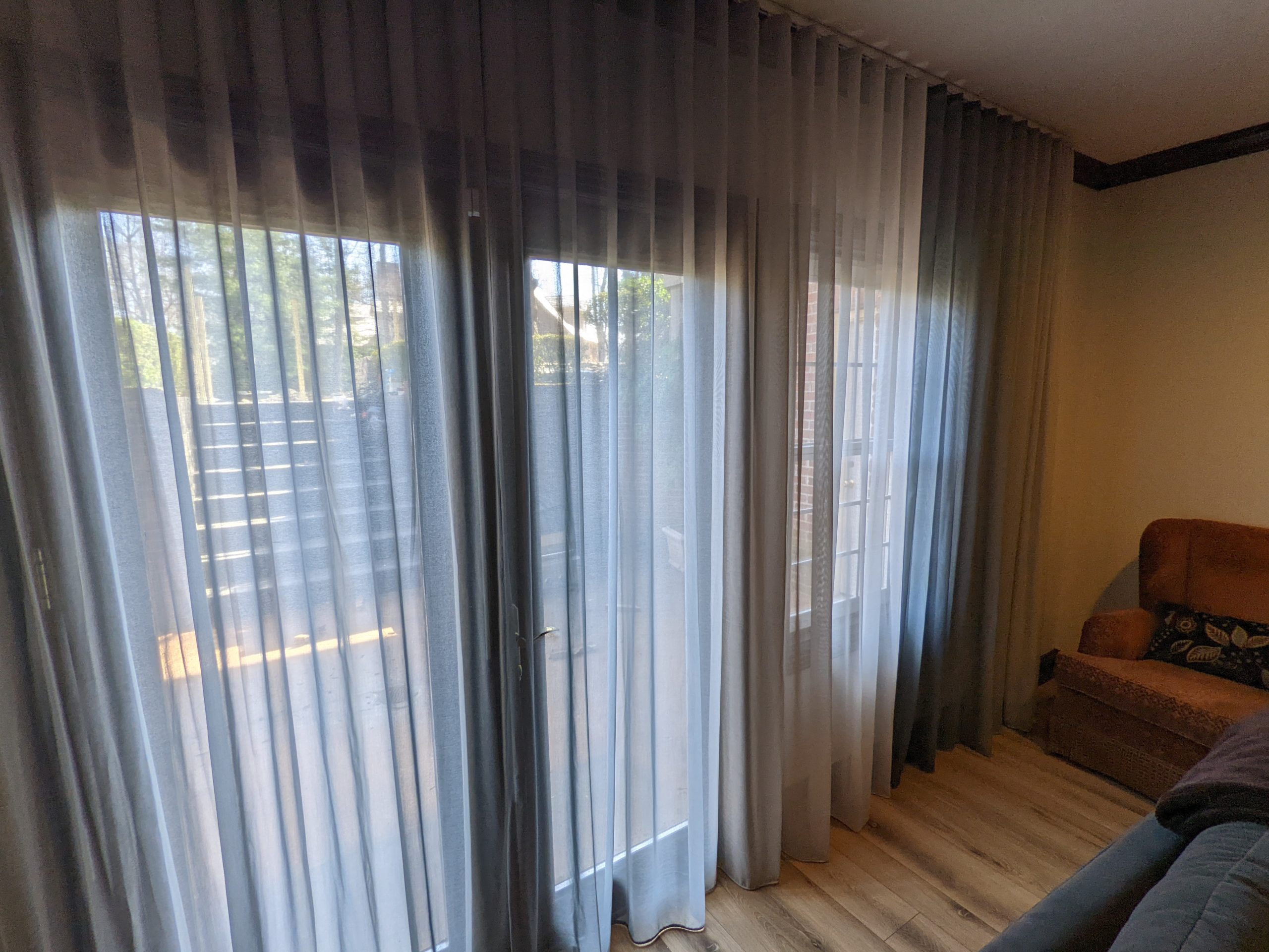 Sheer drapes in walkout basement