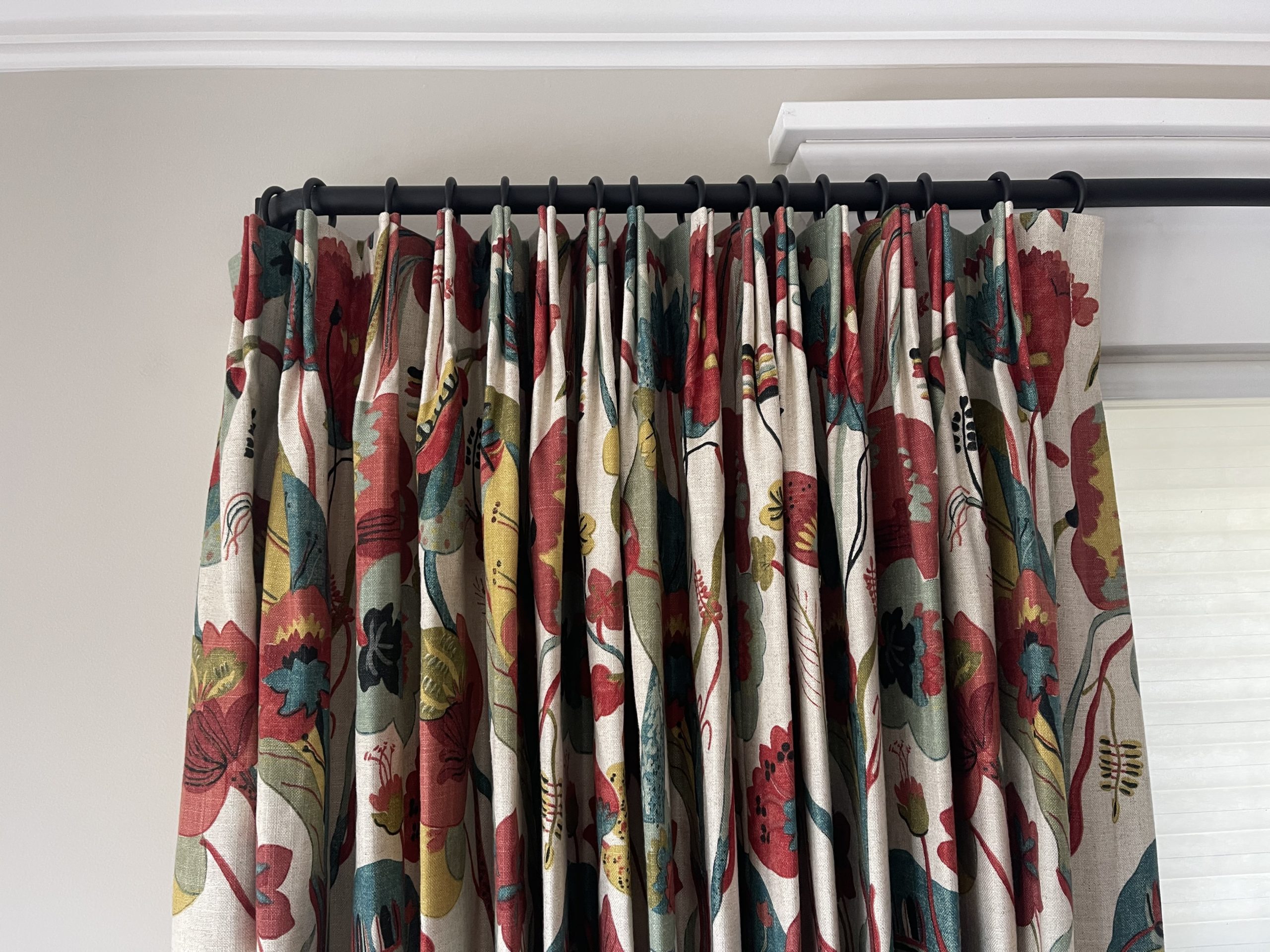 colorful drapes on rod