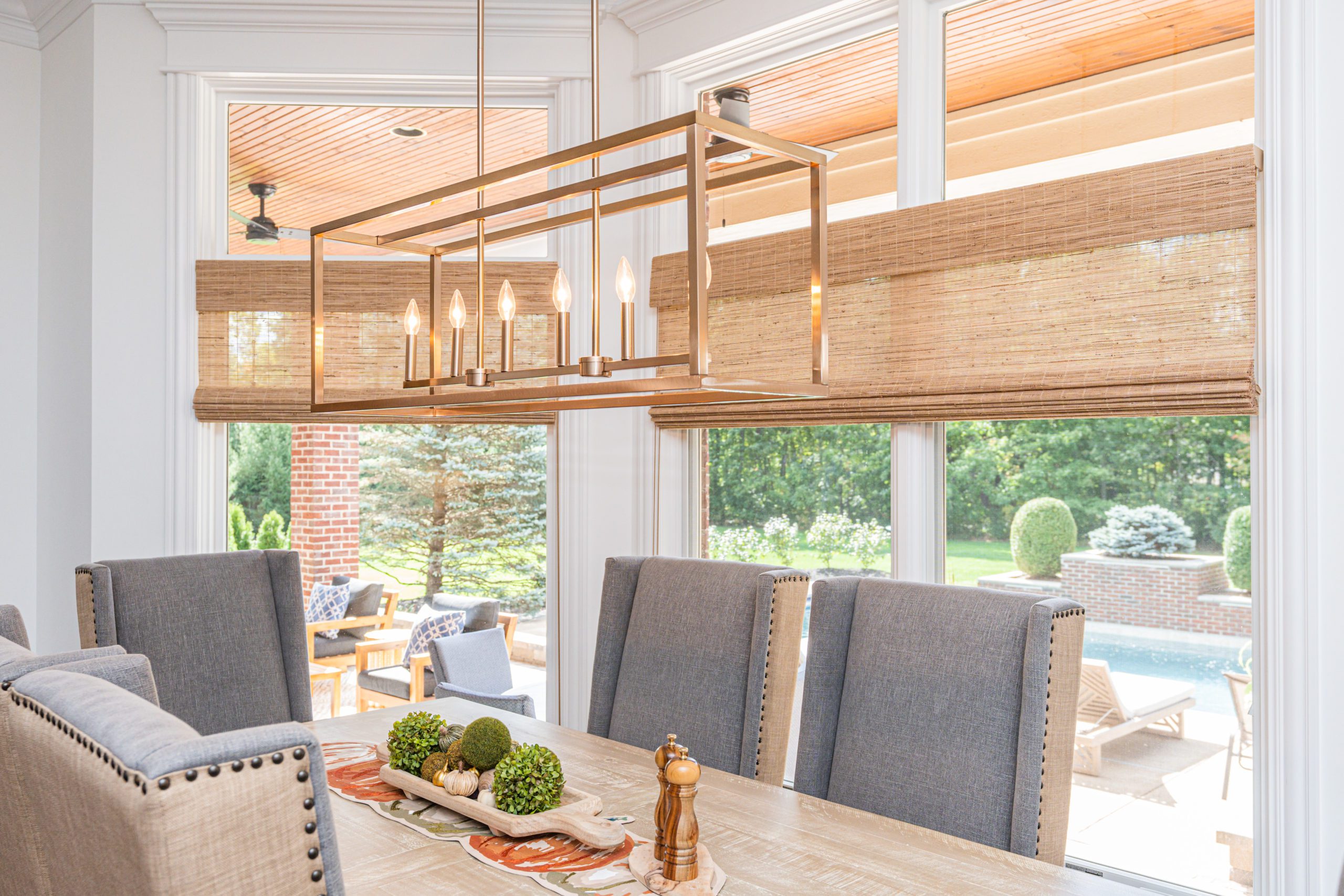 Woven wood shades in dining room to add texture
